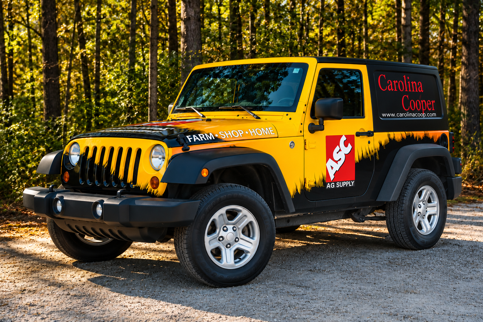 Yellow Carolina Cooper Jeep with black and red branded wrap